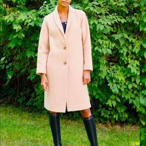 A merino wool jacket in a light blush colour, excellent condition, worn once